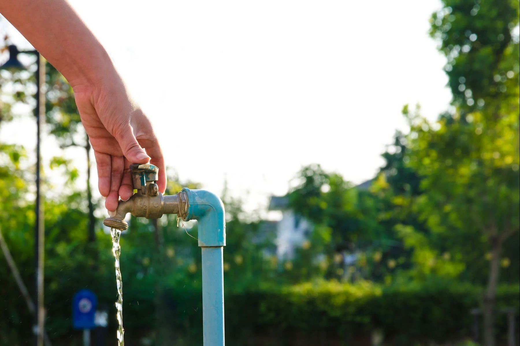 Hand turning off water