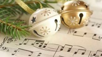 Jingle bells sitting on sheet music
