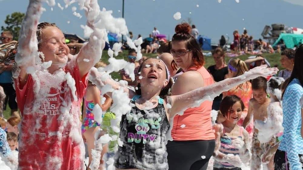 Kids  playing in the foam at Splash Bash